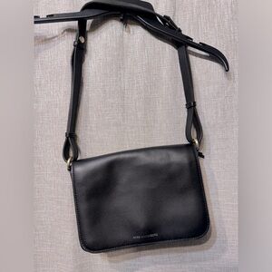 Aimee Kestenberg black leather purse with leopard print trim and stud details